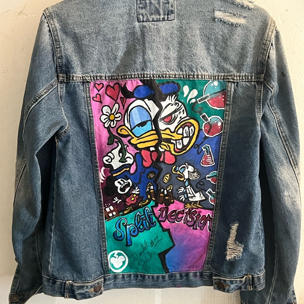 Handpainted Donald Duck film poster on jean jacket
